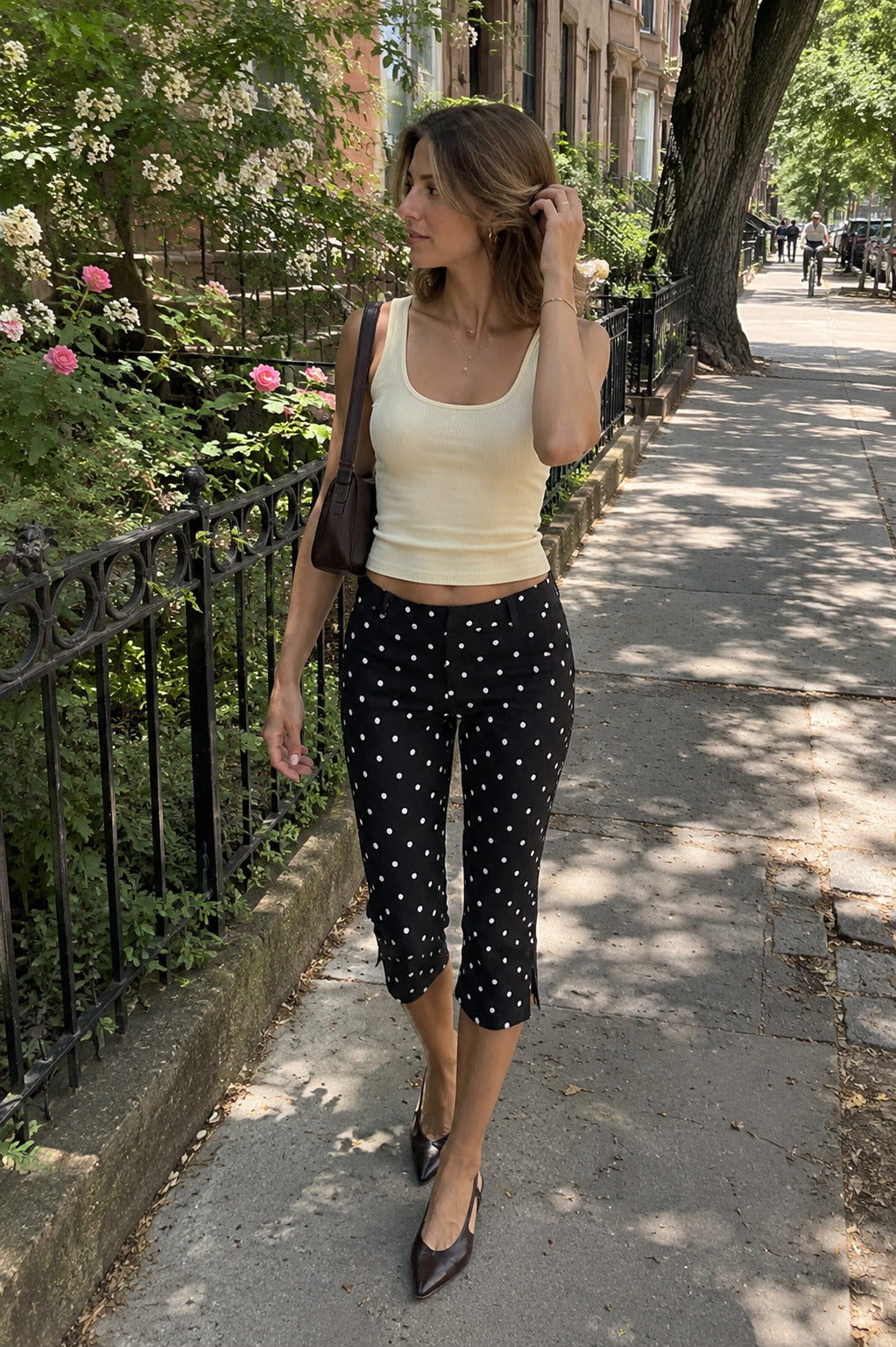 Runa Dots Capri Pants in Black with white dots, front view