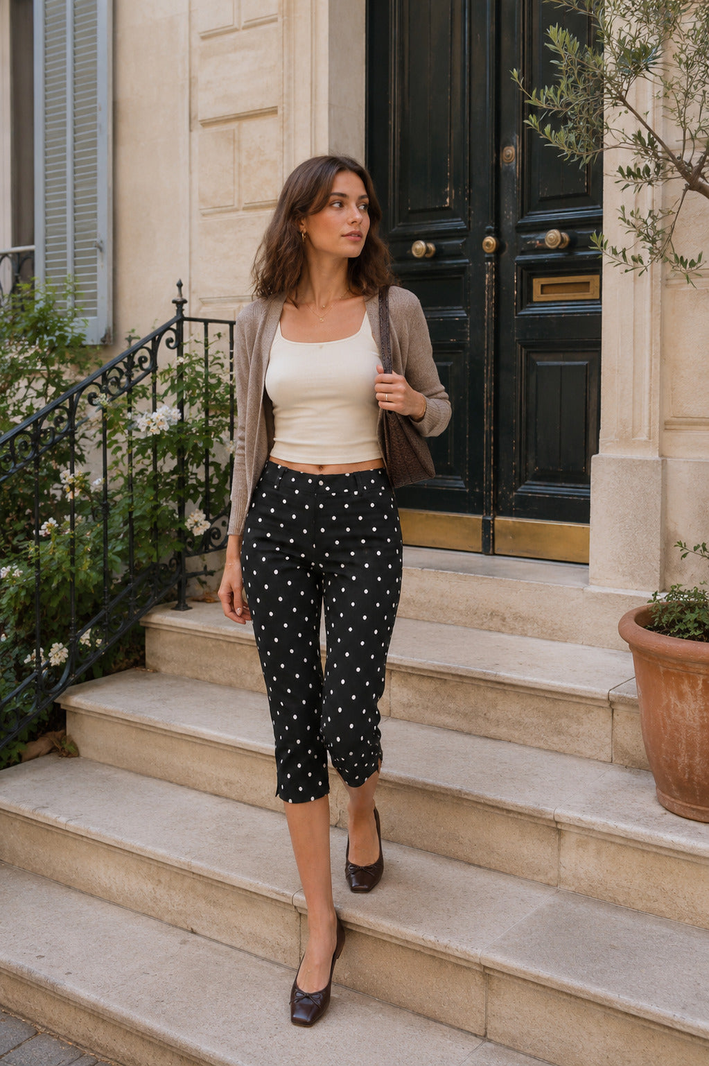 Runa Dots Capri Pants in Black with white dots, outdoor shot