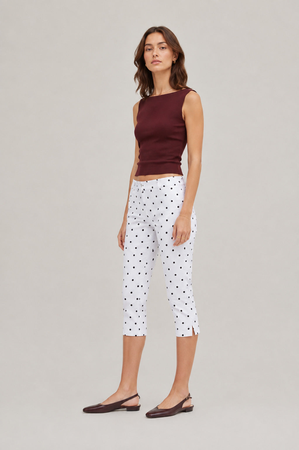Runa Dots Capri Pants in White with black dots, full-length front view